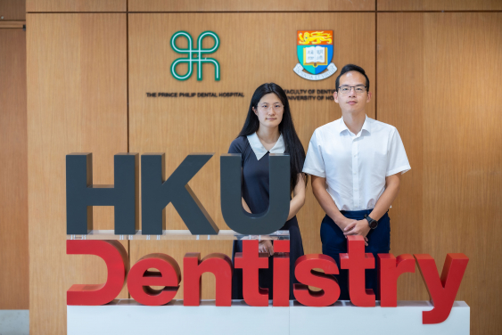 (From right) Professor Shi Huang and PhD student Yufeng Zhang