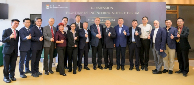 Group photo of Chinese and American academicians and leading scholars in front of the backdrop.